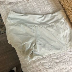 Lululemon Speed Up Mid-Rise Lined Short 4” in “Kohlrabi Green” size 8